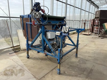 Kuubskistenkantelaar met doseerband